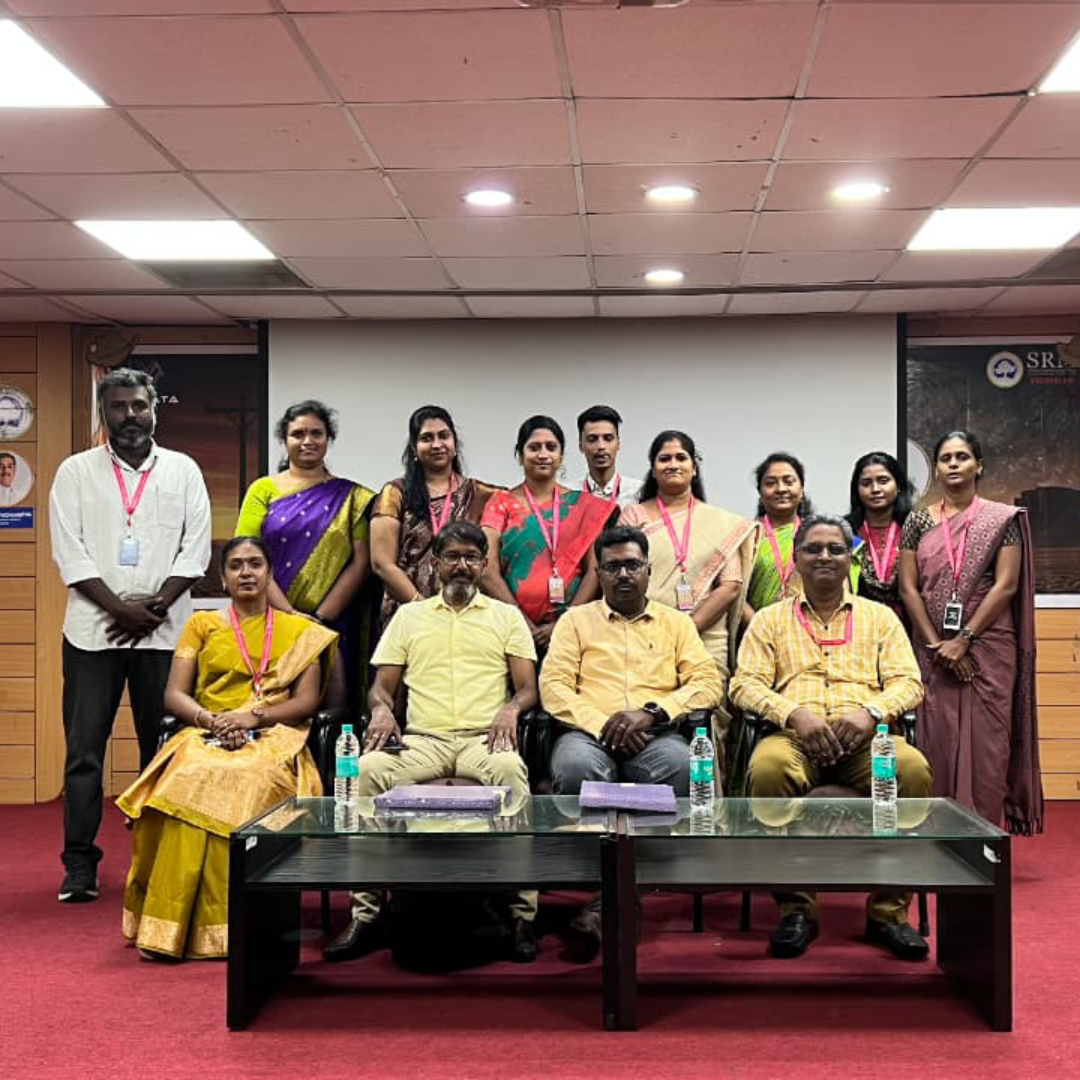 Viswanathan Ganesan of ideas to reach seated with faculty members and organizers of SRM University after a successful management session.